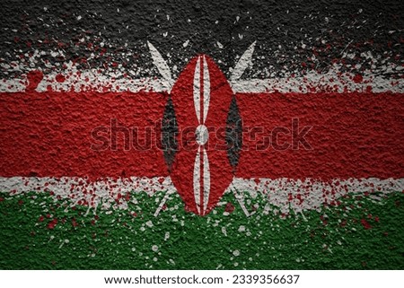 colorful painted big national flag of kenya on a massive old cracked wall