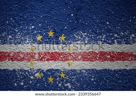 colorful painted big national flag of cape verde on a massive old cracked wall