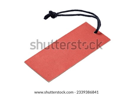 Red cardboard label with slim rope isolated on white background. Price tag or address label on white background. File contains clipping path.