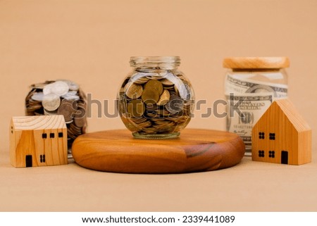 saving money in a glass jar salary cash daily money cash flow financial loan saving money and time Money saving concept for financial investment.