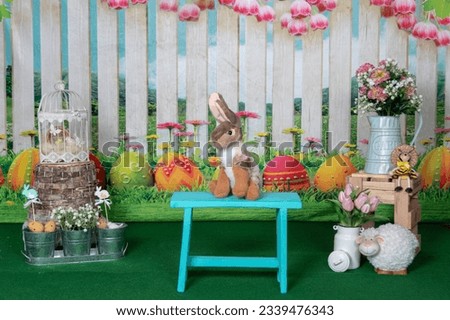 Easter photo background decoration concept with eggs, bunny and flowers