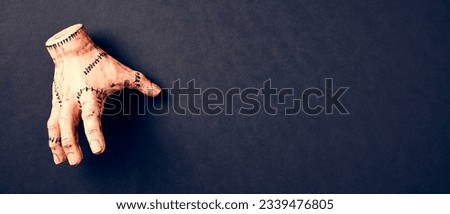 The thing on black background. Wednesday Halloween party banner design. Royalty-Free Stock Photo #2339476805