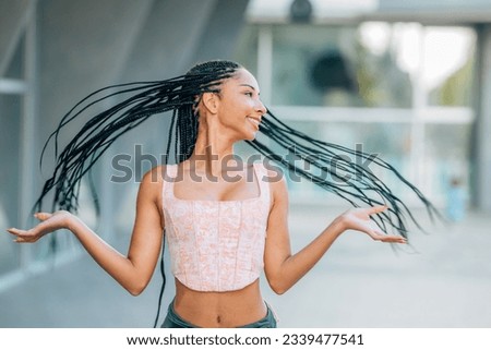 girl on the street with braids on the street