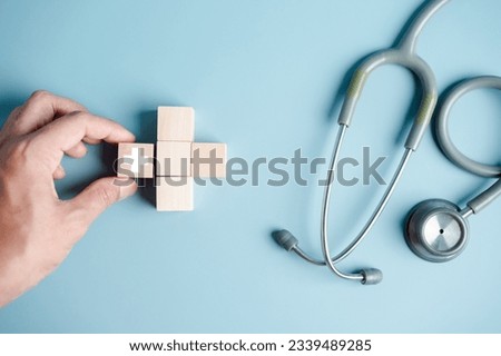 Health insurance concept. people hand holding plus and healthcare medical icon, health and access to welfare health concept.
