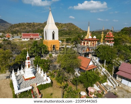 Drone aerial view of Wat Khao Lan Thom a Thai buddhist temple in Hua Hin, Prachuap Khiri Khan, Thailand.