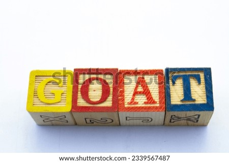 The term GOAT visually displayed on a clear background with copy space
