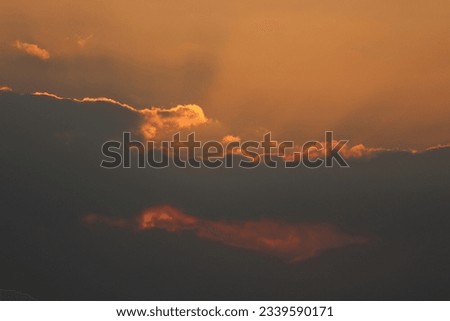 Sky and beautiful clouds with the sunlight at sunset.