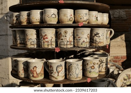 Beautiful colorful traditional ceramic crafted decoration items in the handicraft market.	
