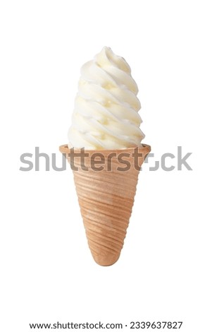 Vanilla soft ice cream in waffle cone isolated on white background with clipping path.