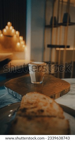 Coffee Cup with ambiance and cinematic lighting. Sandwhich and Lights with coffee. Moody Coffee Picture