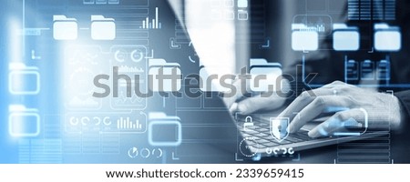 Businessman fingers typing on laptop, toned image with document management system dashboard. Files storage and digital statistics with data security. Concept of online database