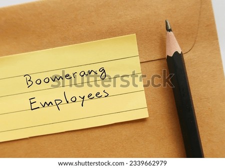 Pencil on office envelope with note written - Boomerang Employees - workers returning to a former employer as a rehired employee after leaving company for any reasons Royalty-Free Stock Photo #2339662979