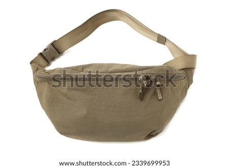 green waist bag on a white background Royalty-Free Stock Photo #2339699953