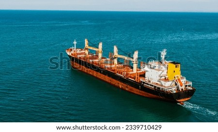 Cargo ship with grain sails on the sea, aerial view. Grain deal, trade with African countries Royalty-Free Stock Photo #2339710429
