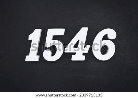 Black for the background. The number 1546 is made of white painted wood.