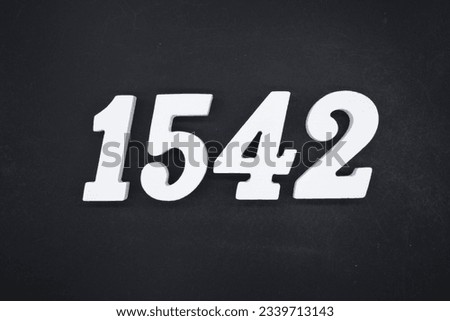 Black for the background. The number 1542 is made of white painted wood.