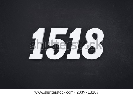 Black for the background. The number 1518 is made of white painted wood.