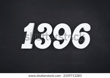 Black for the background. The number 1396 is made of white painted wood.