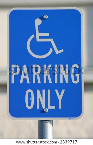 Blue and white handicapped parking sign