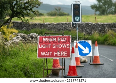 Road works around the corner in the Yorkshire Dales  Royalty-Free Stock Photo #2339743571