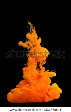 Orange Acrylic colors ink in water isolated Abstract and bright. subject photo, cosmetics, drinks and advertising concept .