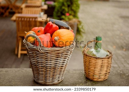 Big basket with autumn vegetables. Halloween decoration.