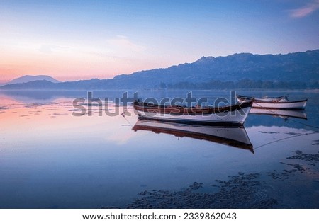 Muğla, Türkiye, view of Bafa lake, wooden boats.