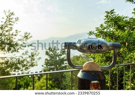 Sightseeing Panoramic Binoculars At Alanya Fortress. Touristic telescope look at the city with view Alanya, Antalya Turkey. travel nature concept.  Royalty-Free Stock Photo #2339870255