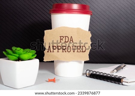 Rubber stamping that says 'FDA Approved'