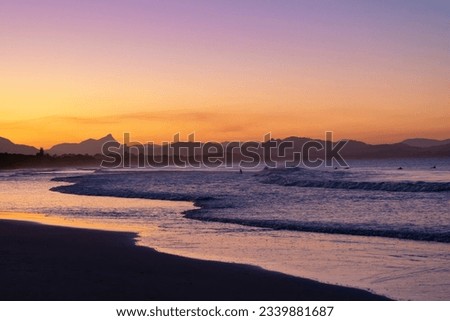 Sunset beach views across Main Beach in Byron Bay, New South Wales, Eastern Australia Royalty-Free Stock Photo #2339881687
