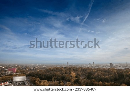 Selective blur on a panorama of Cologne, an aerial view, in the morning, with a focus on suburbs and koln neustadt. Cologne is the main city of North Rhine Westphalia, in Germany. Royalty-Free Stock Photo #2339885409