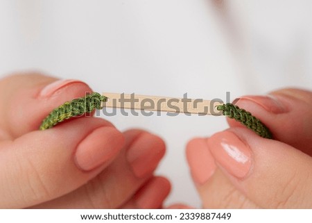 A silver bracelet on a well-groomed lady. Product image that can be used in e-commerce, social media, online sales. Jewelry photo with woman jewelry concept.