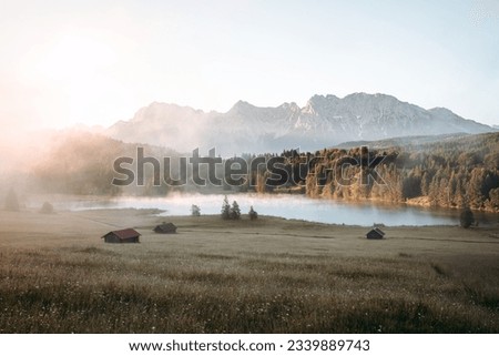 Amazing foggy Sunrise at Geroldsee, also Wagenbruchsee, Bavaria, Germany Europe Royalty-Free Stock Photo #2339889743