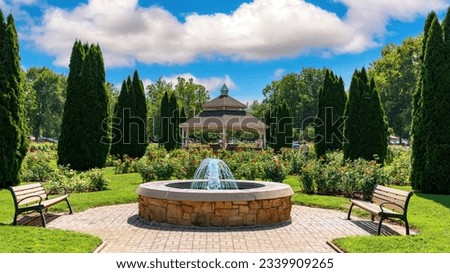 Fountain and benches at a popular city park in Boise Idaho Royalty-Free Stock Photo #2339909265