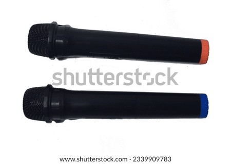 Two black microphone isolated on white background