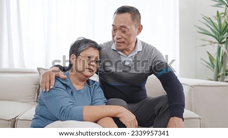 Asian elderly man caring wife embracing bonding comforting and express empathy, supporting giving loving. Couple retirement lifestyle