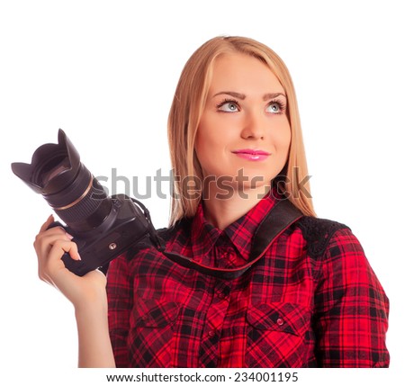 Attractive woman photographer thinking on idea of a shot - isolated on white