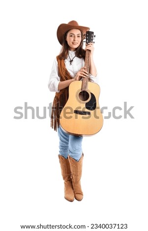 Beautiful cowgirl with guitar on white background