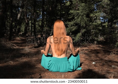 Meditation in the forest during summer