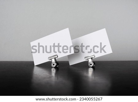 Photo of two blank white business cards. Template for graphic designers portfolios.