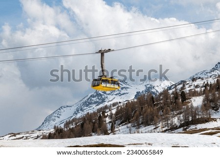 the cable car that connects the top of Mount Diavolezza with the Pontresina valley. Royalty-Free Stock Photo #2340065849