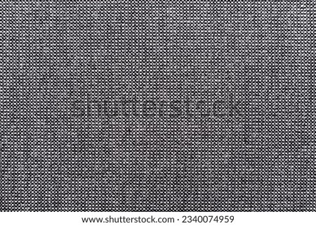 Carbon fiber background. Texture of black fabric for tailoring, Cloth. textile
