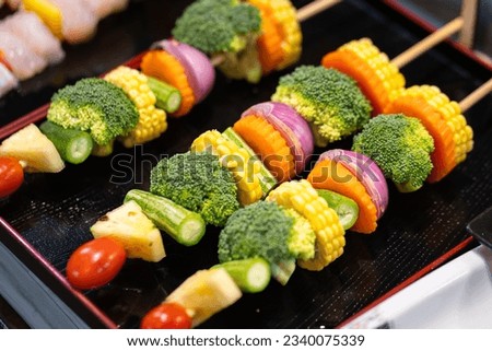 Various kind of vegetable skewer for BBQ party meal. Food object photo, close-up and selective focus.