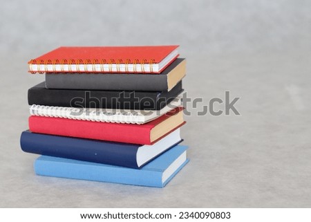 Books on gray background school education library
