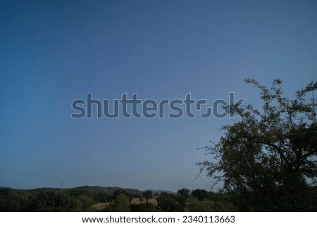 Landscape of a clear sky with stars that seems to be day.