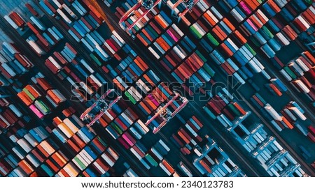 Logistics and transportation of Container Cargo ship and Cargo plane with working crane bridge in shipyard.  international containers cargo ship at industrial import-export port.  Royalty-Free Stock Photo #2340123783