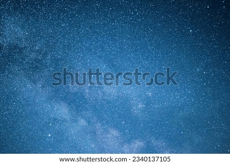 Night sky with stars and parts of the Milky Way in the Eifel region of Germany