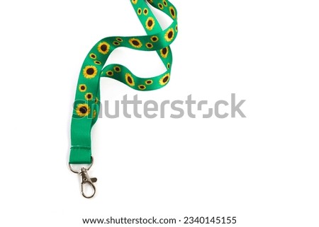 Sunflower lanyard, symbol of people with invisible or hidden disabilities.