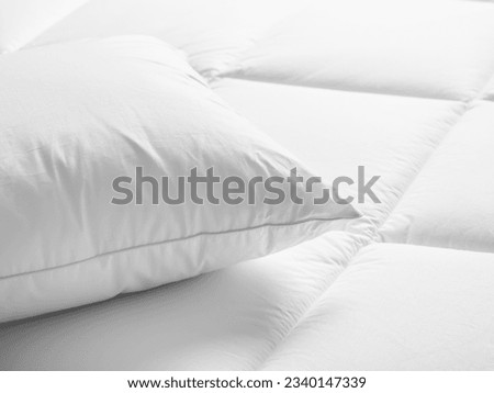 Closeup of white pillow on the bed in the bedroom Royalty-Free Stock Photo #2340147339