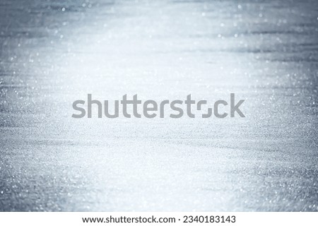 COLD BLUE GLITTERING ICE BACKGROUND, CHRISTMAS SHINY BACKDROP FOR MONTAGE WINTER FRESH PRODUCTS OR CHRISTMAS PRESENTS